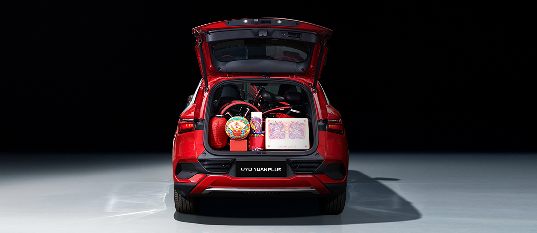 BYD Yuan Plus electric SUV in metallic silver, compact modern design with sleek headlights and aerodynamic lines.